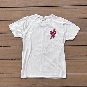 Lira White Tee with Red Floral Accent